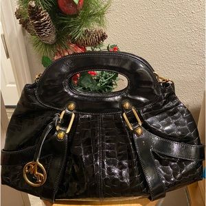 Large, black patent leather bag